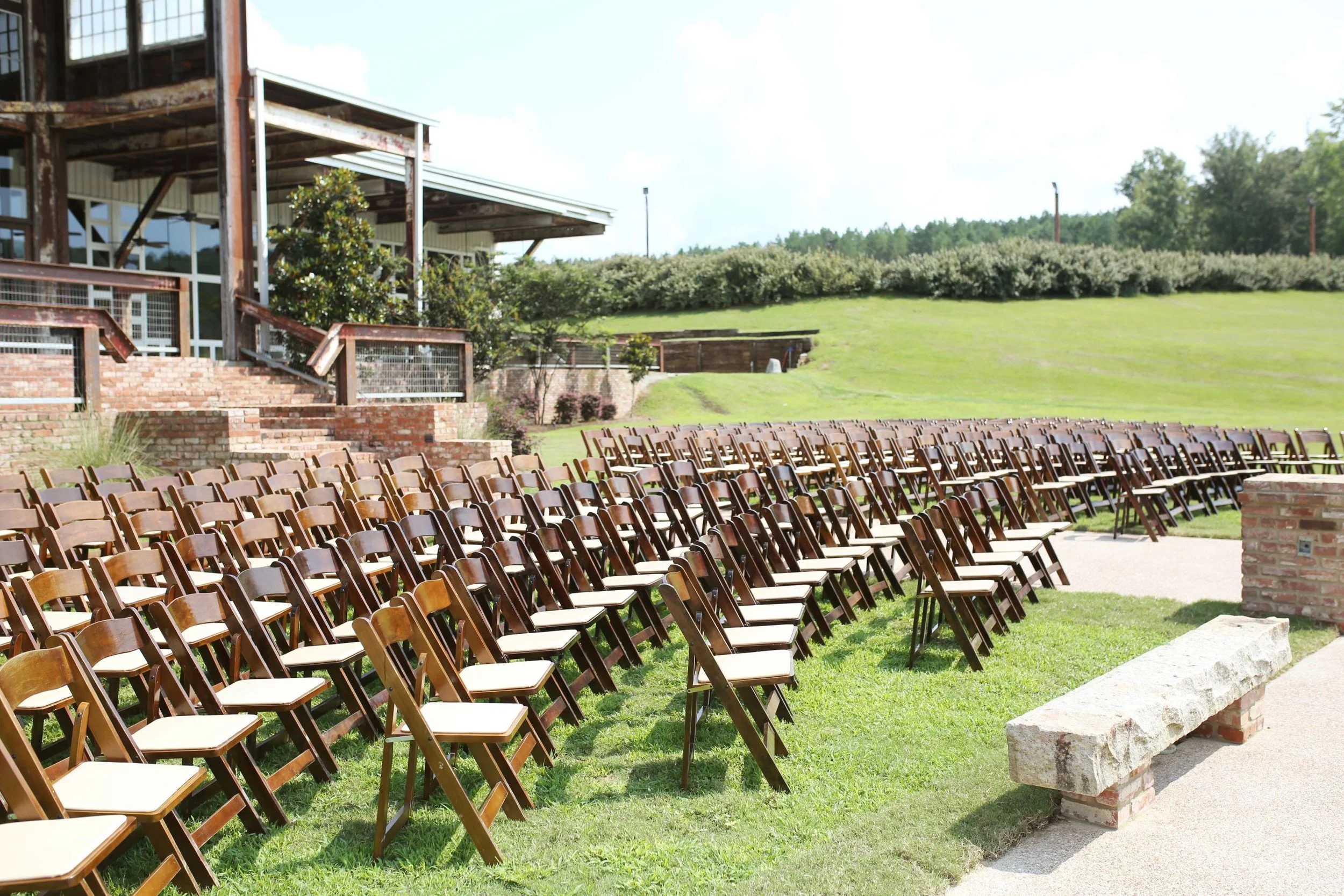 chairs setup for an outdoor ceremony facing the lake at the Jefferson Oxford