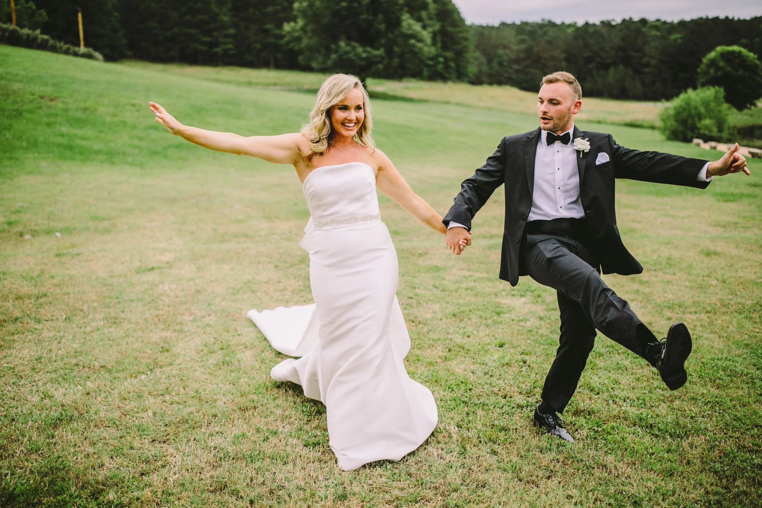 couple prancing lawn wedding day jefferson oxford ms