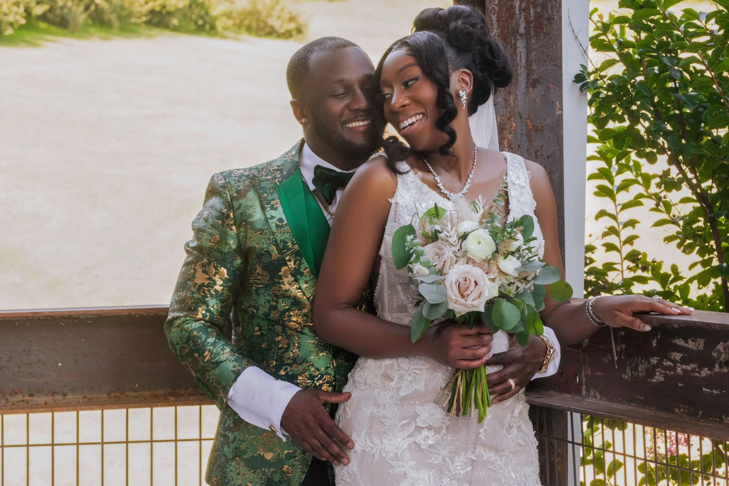 couple after wedding ceremony on lakefront covered porch jefferson oxford ms