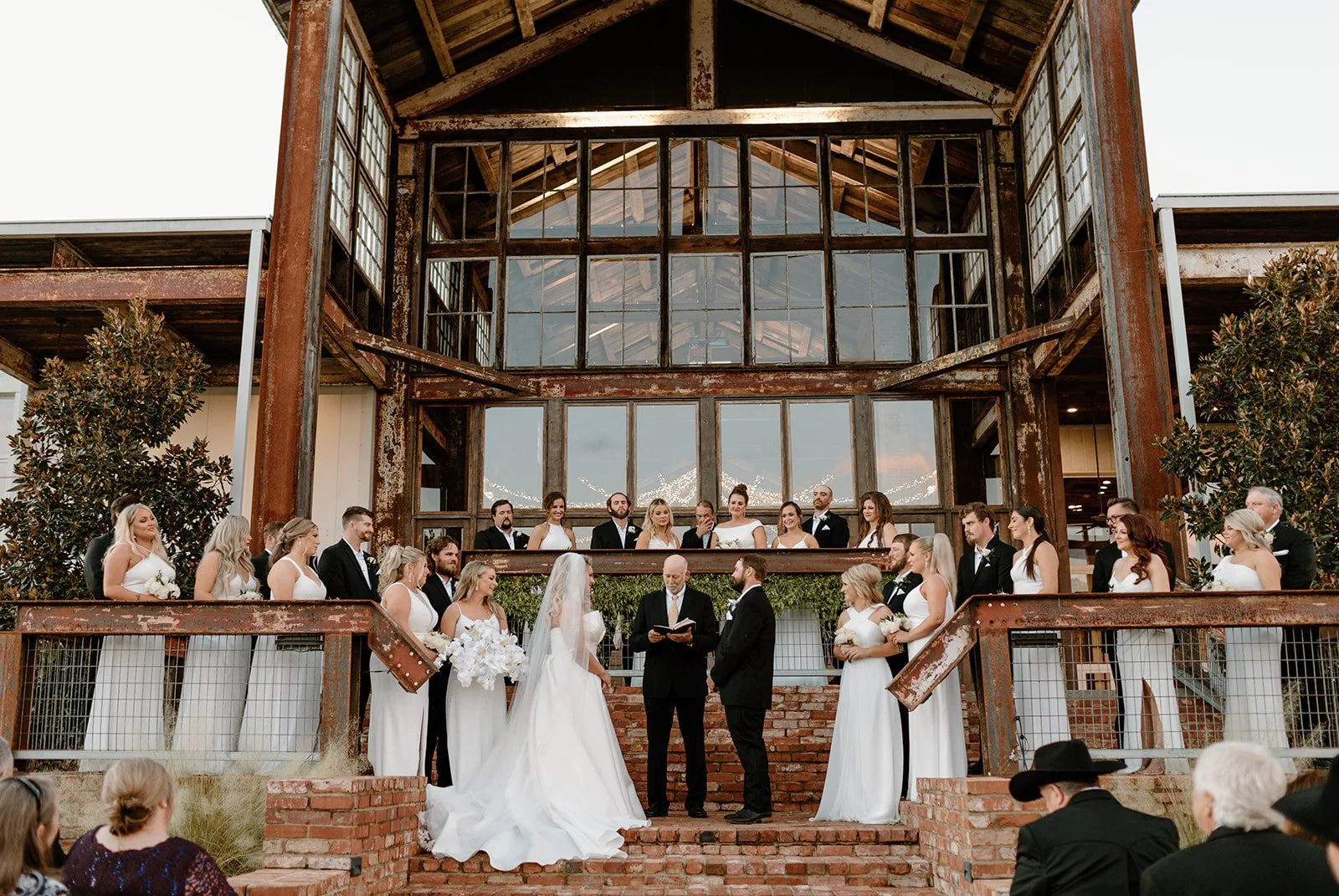 fall outdoor ceremony on lakefront stairway at The Jefferson Oxford