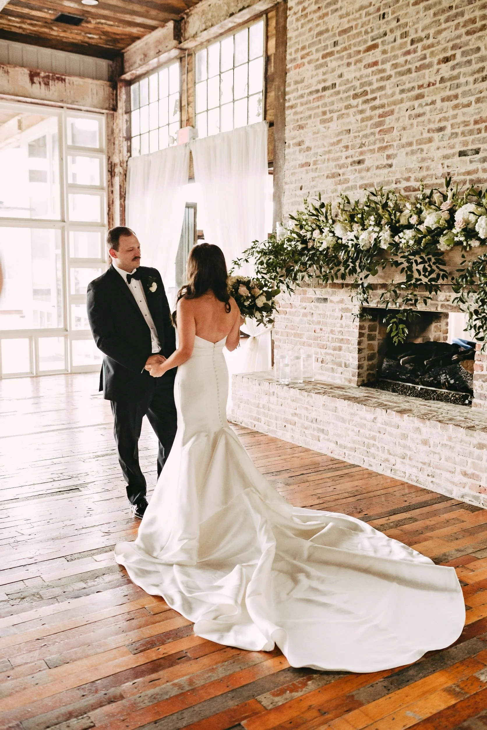 first look bride and groom lakefront walkway at The Jefferson Oxford