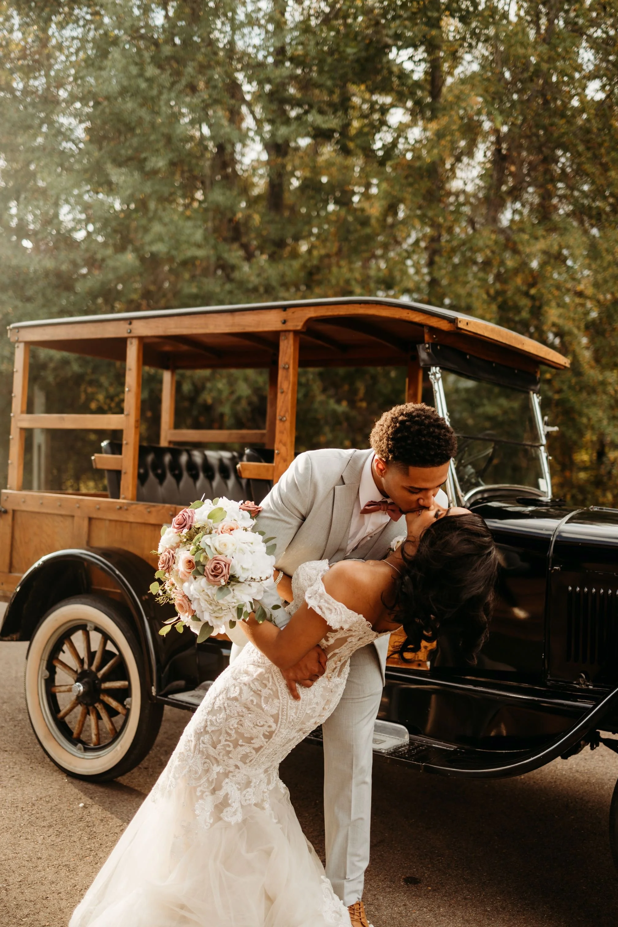 bride and groom antique getaway car wedding send-off at the jefferson Oxford