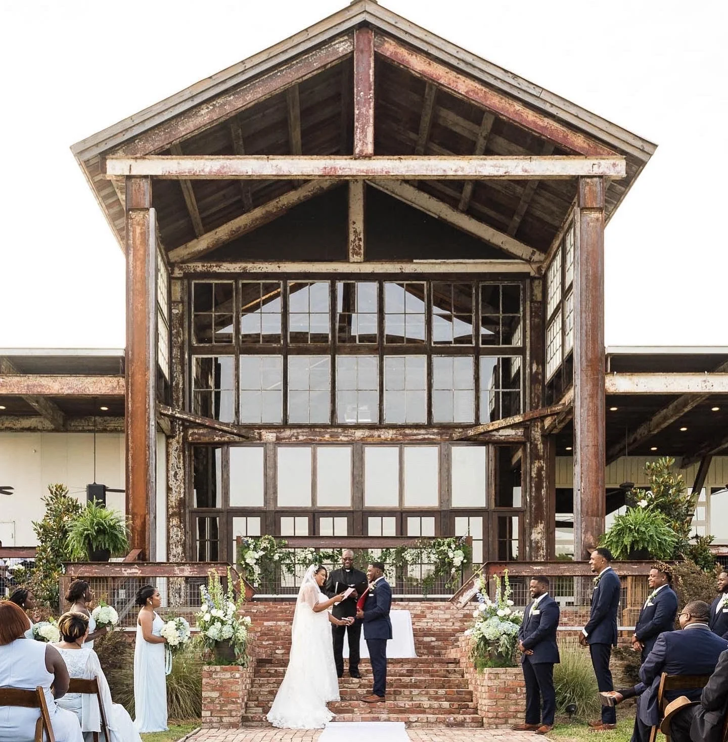 outside ceremony on lakefront stairway at The Jefferson Oxford