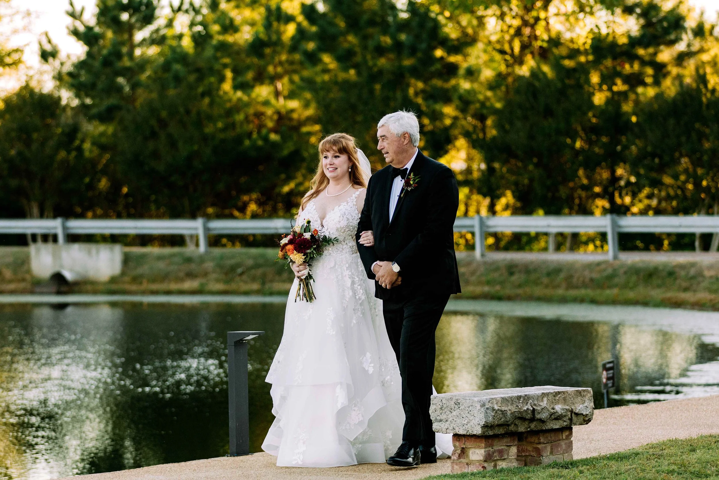 bride and dad lakefront walkway entering outdoor ceremony jefferson oxford