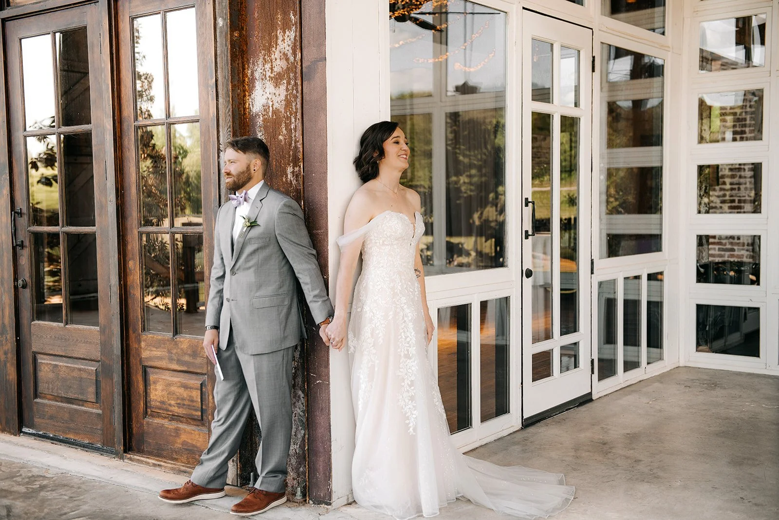 first look bride and groom covered porch at The Jefferson Oxford