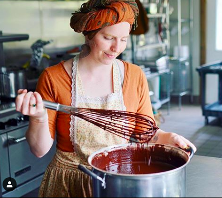 Photo of Ghee Goddess Kearsley whisking a Cacao Blend in our Kitchen. Photo by Halle Hirsch-Martin