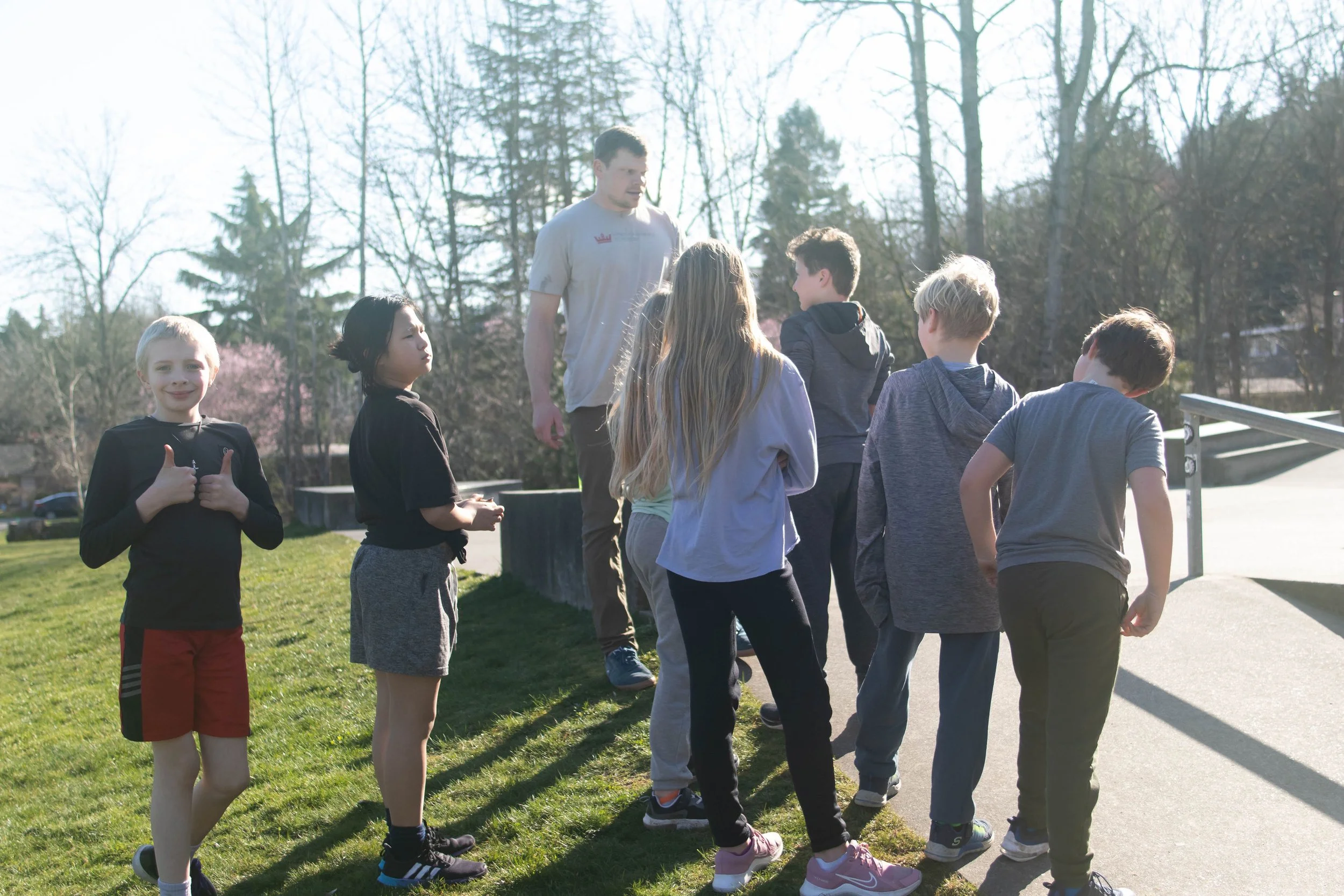 Nick coaching kid smiling Mercerdale Park.jpg