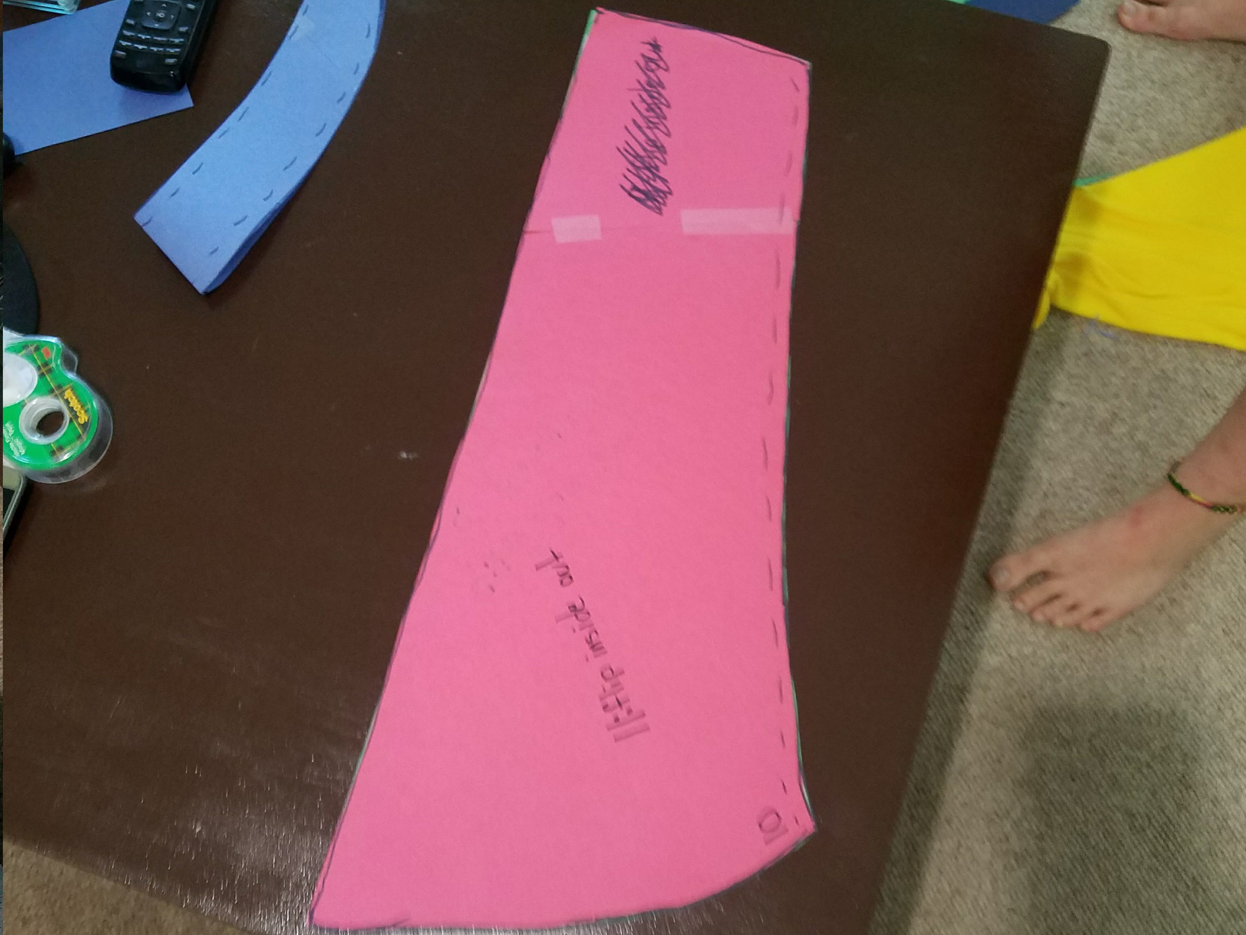 10. Sew the long edges together to form the sleeve. 11. Flip the finished sleeve inside-out.