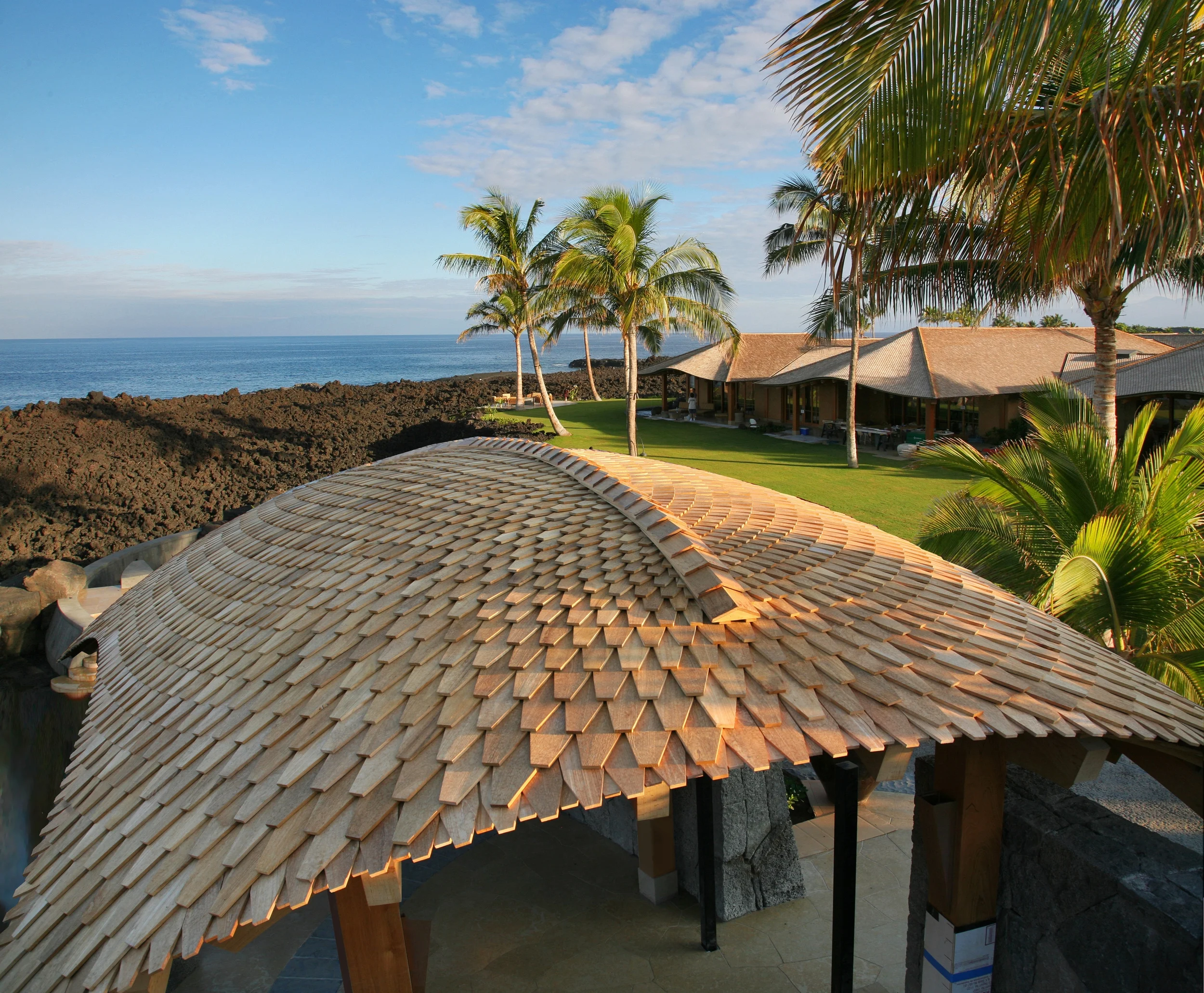 Steam-bent, reclaimed Teak shingles in graduated sizes. Kailua Kona, Hawaii