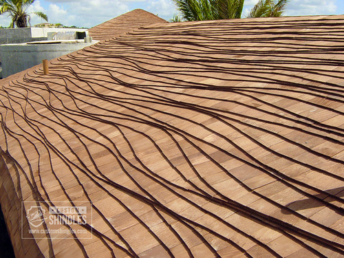 The unique undulating style of this home's cottage roof