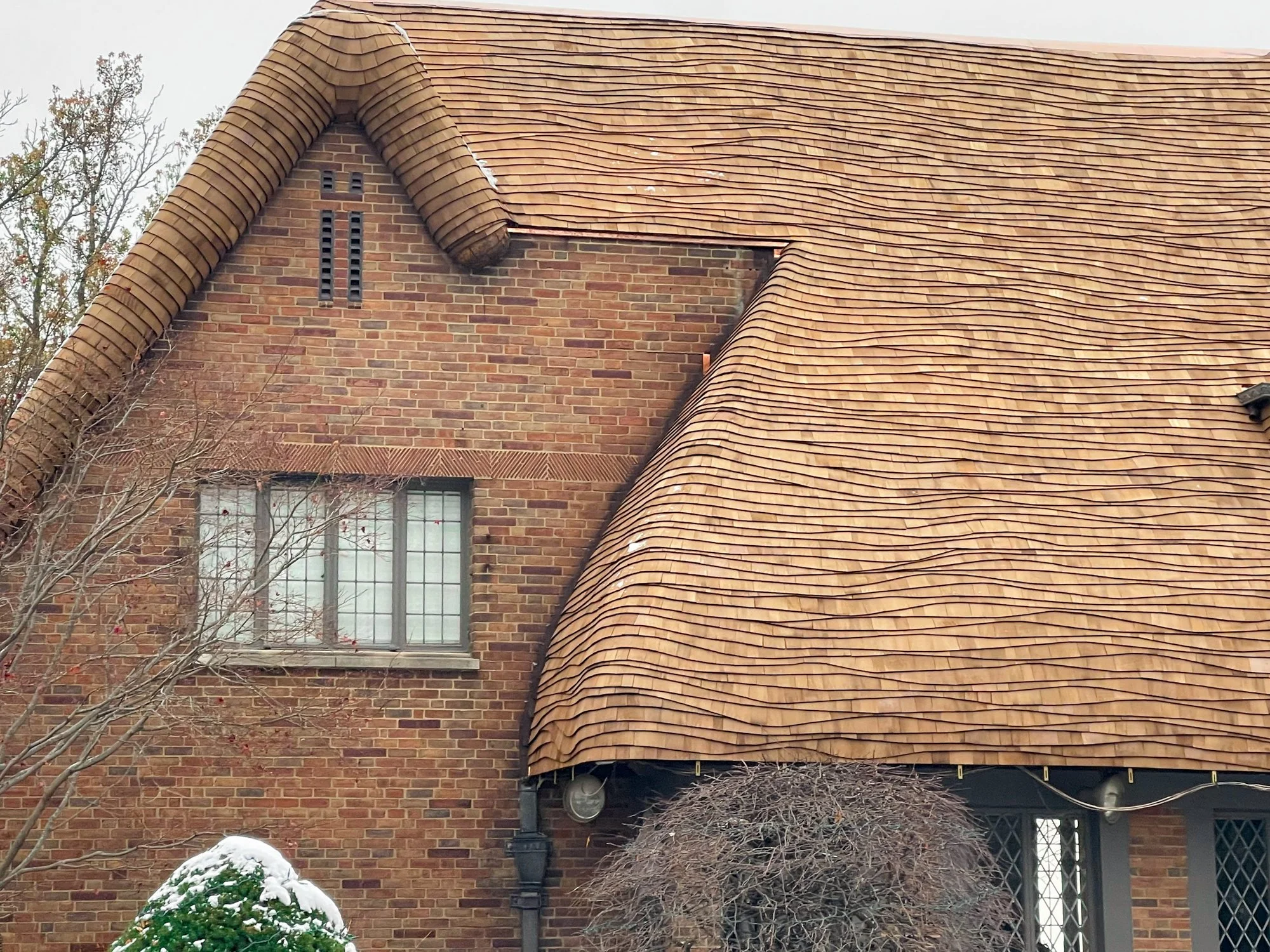 Storybook Style Roof Install with Carrot Rake on Michigan Home