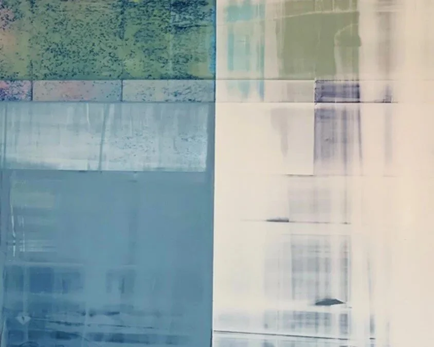 Abstract artwork with geometric shapes in shades of green, blue, and white.