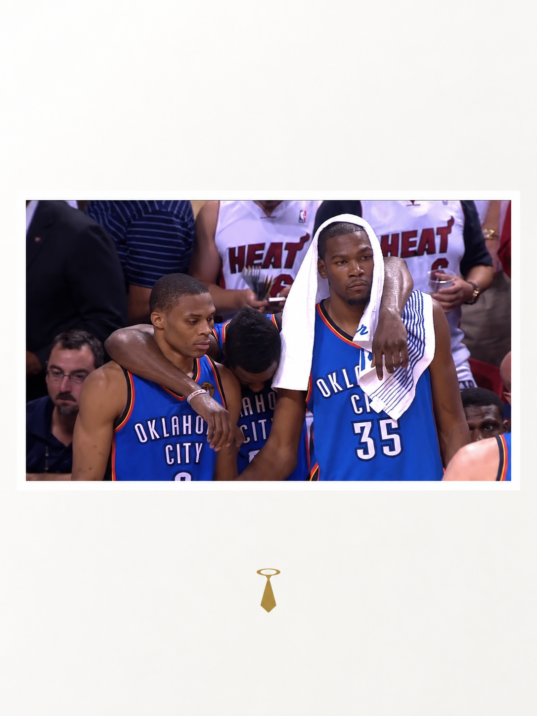 Three Oklahoma City Thunder basketball players standing on the court, with one draping a towel over his head and shoulders, and others showing expressions of exhaustion or contemplation after a game.