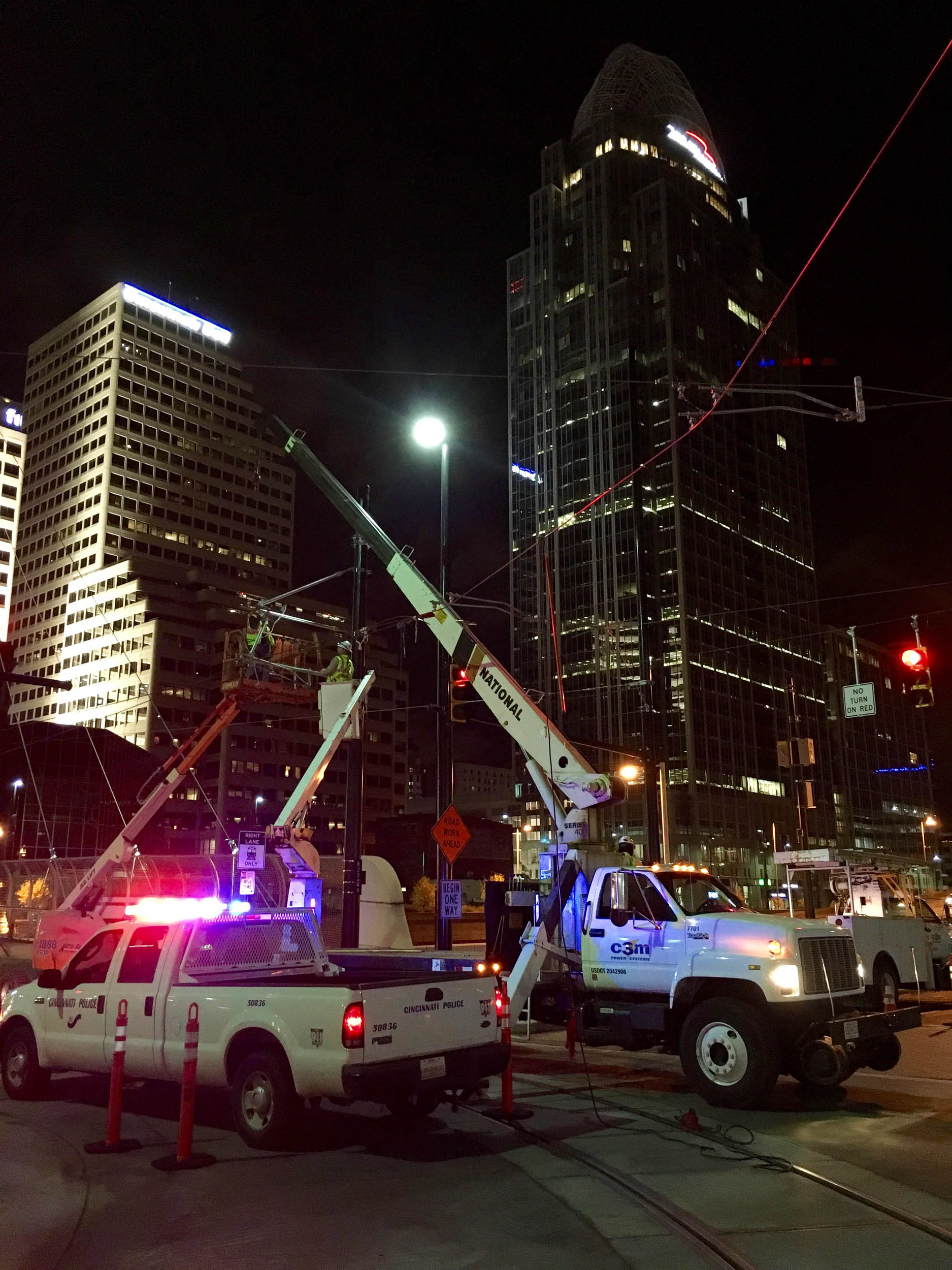 Cinci Streetcar Guys Working at Night.jpg