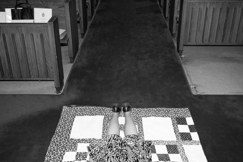 Rehearsal of Rosemary Smead's ordination in Louisville Kentucky. The candidates to priesthood must lay on the ground of the Church. Women's ordinations must rigorously follow all the procedures and prerequisites of man ordinations. The only change allowed is the sex of the candidate. (United States, 2013)