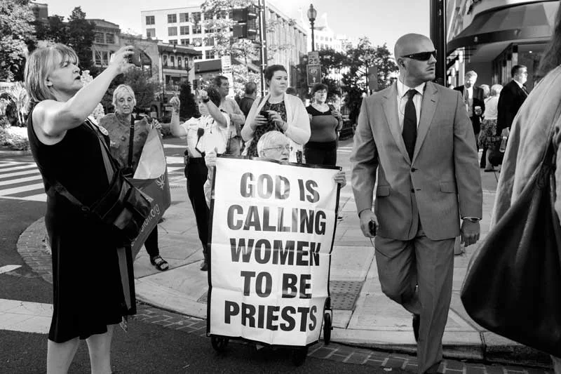 Demonstrators, among them priests and theologians, calling for the Catholic church to include female priests, gather prior to the arrival of Pope Francis at the Cathedral of St Matthew the Apostle, Washington D.C. (United States, 2015)