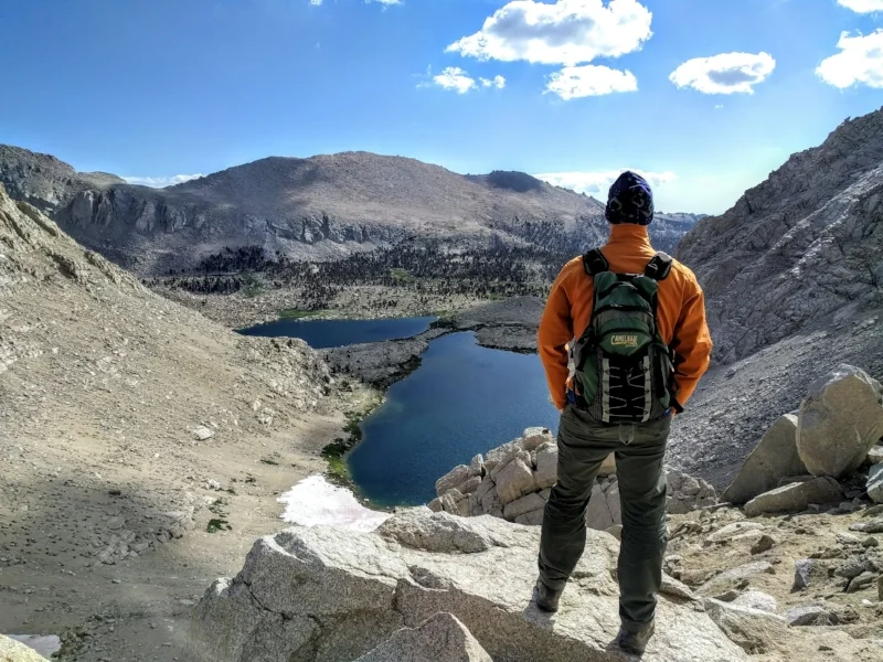 Steve taking in the beauty of the mountain and lake before him (Old Army Pass, Mt Langley)