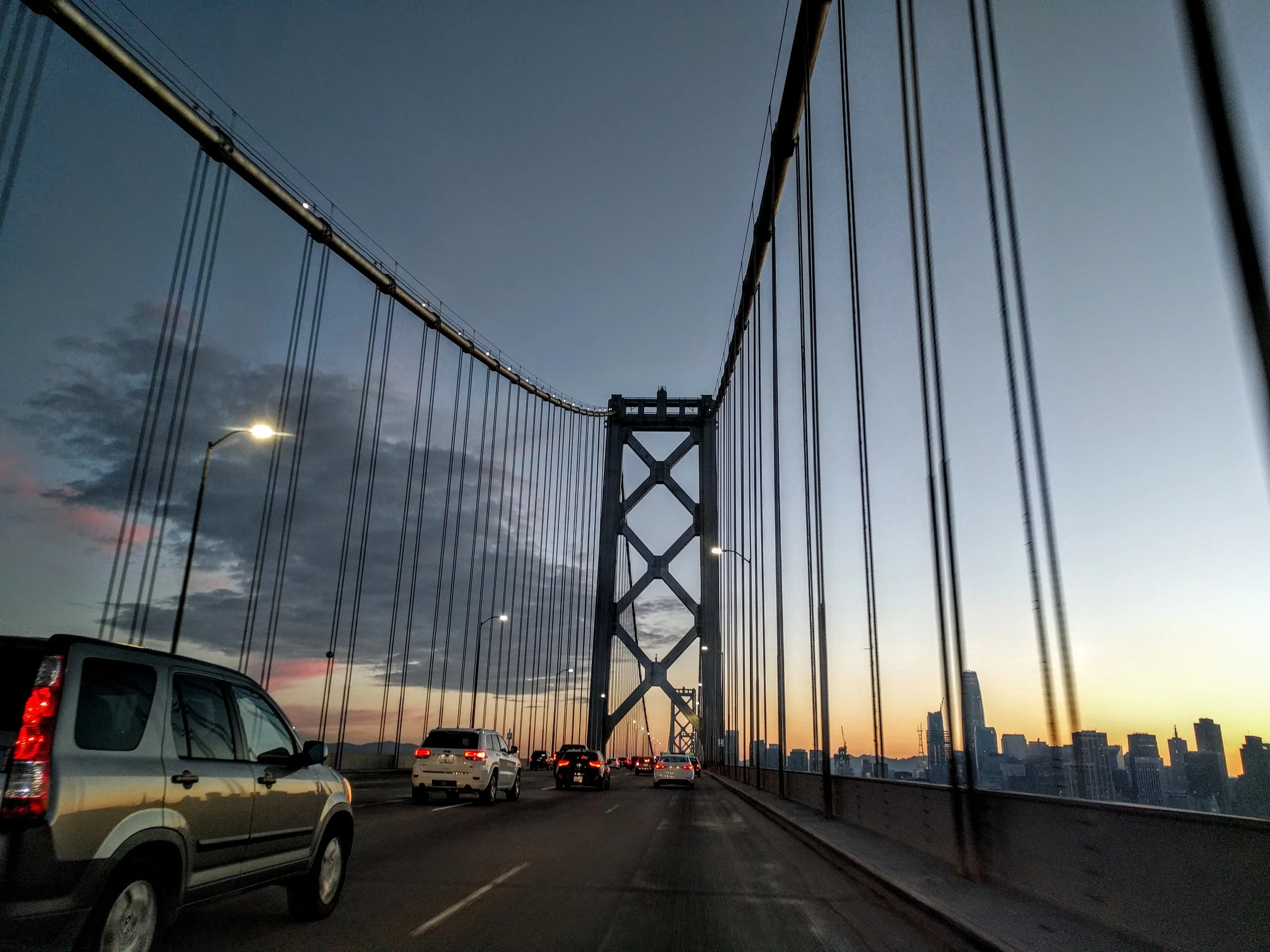 On the Golden Gate Bridge, approaching the enigmatic city of San Francisco where I live, on a beautiful spring day at dusk.
