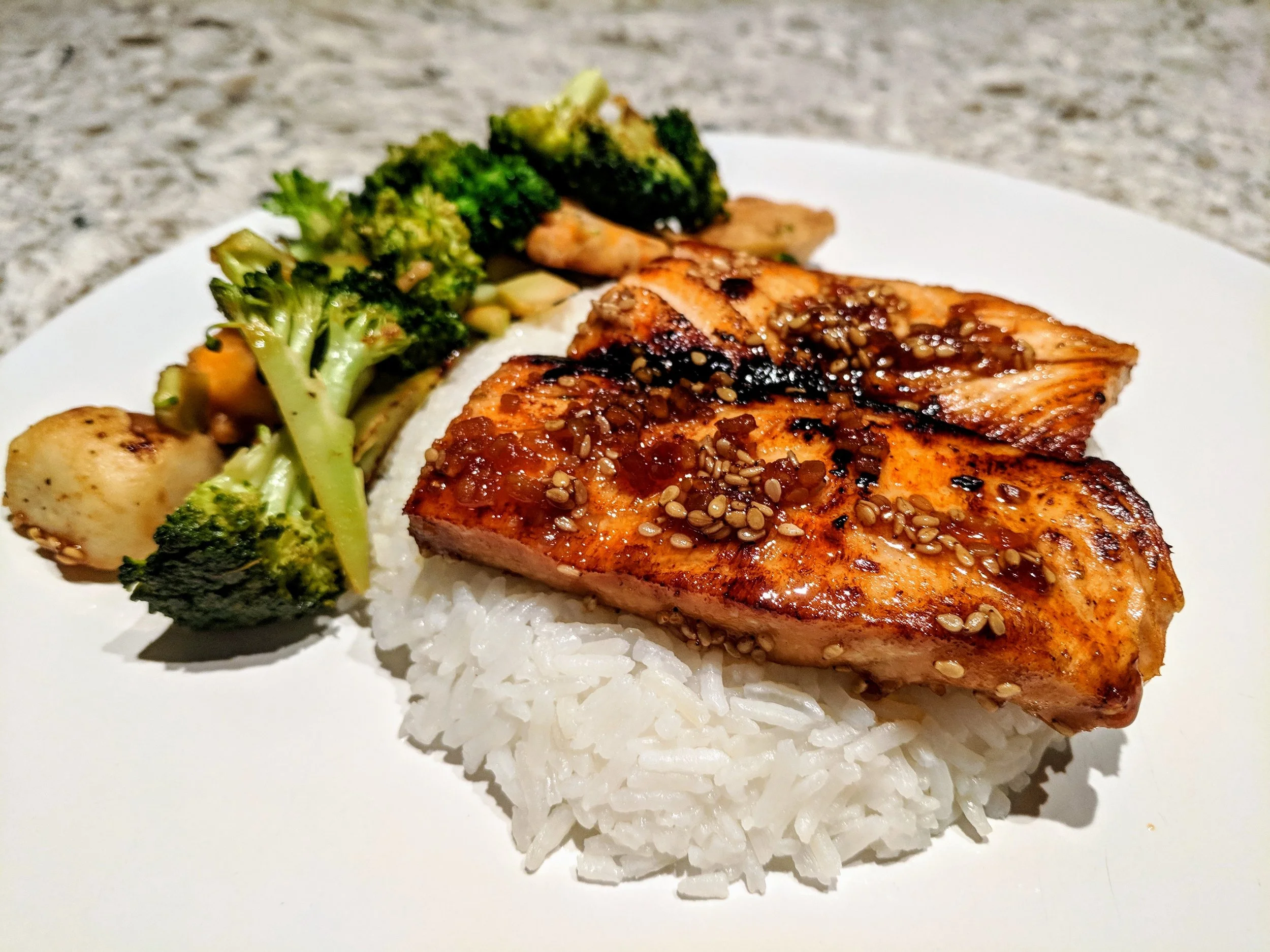 One of the simplest and quickest meals I whipped up for my husband and I at home is salmon teriyaki and stir fried broccoli over rice