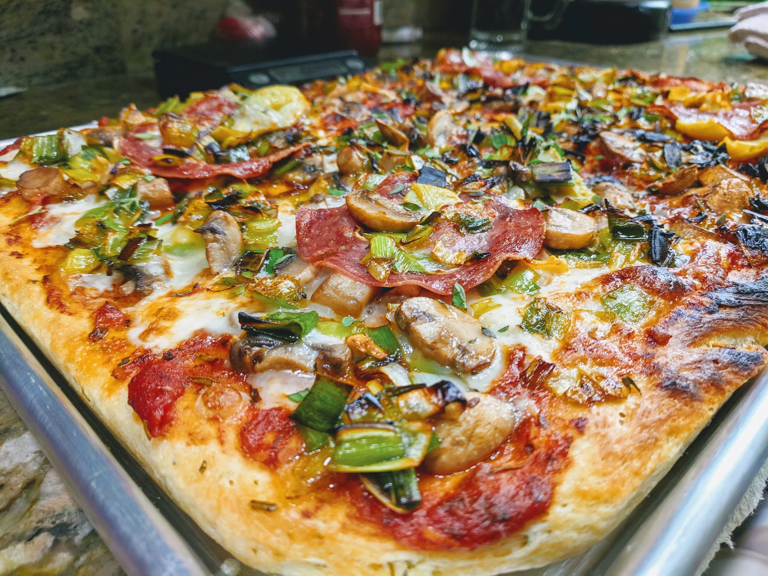 Yes, we made this awesome pizza from scratch - dough, ingredients and all. Well, Bernard was the leading chef, I was merely doing as I was told. The pizza tasted nothing less than amazing, better than any I’ve had in Italy lol