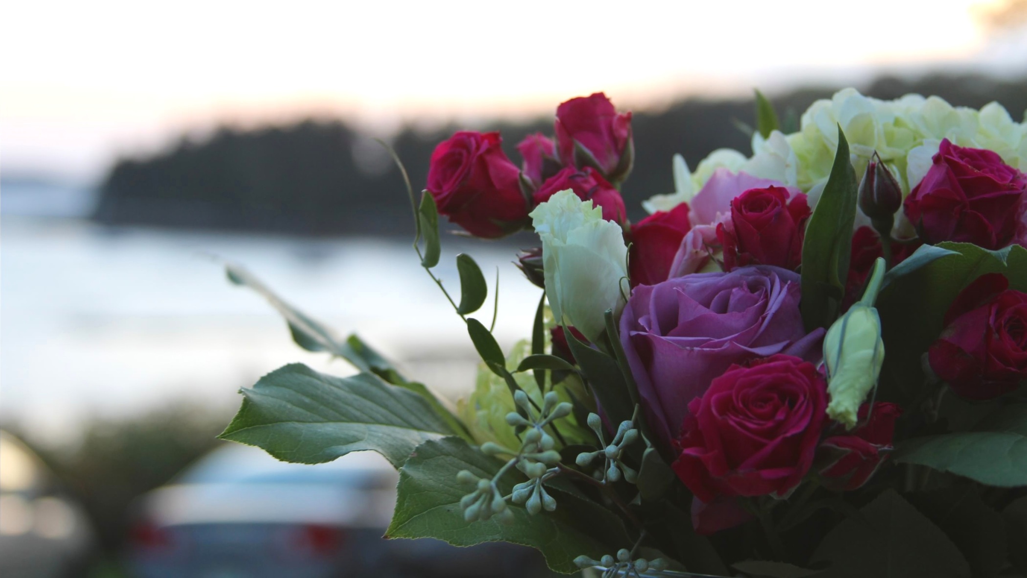 Beautiful wedding bouquet with ocean in the distance