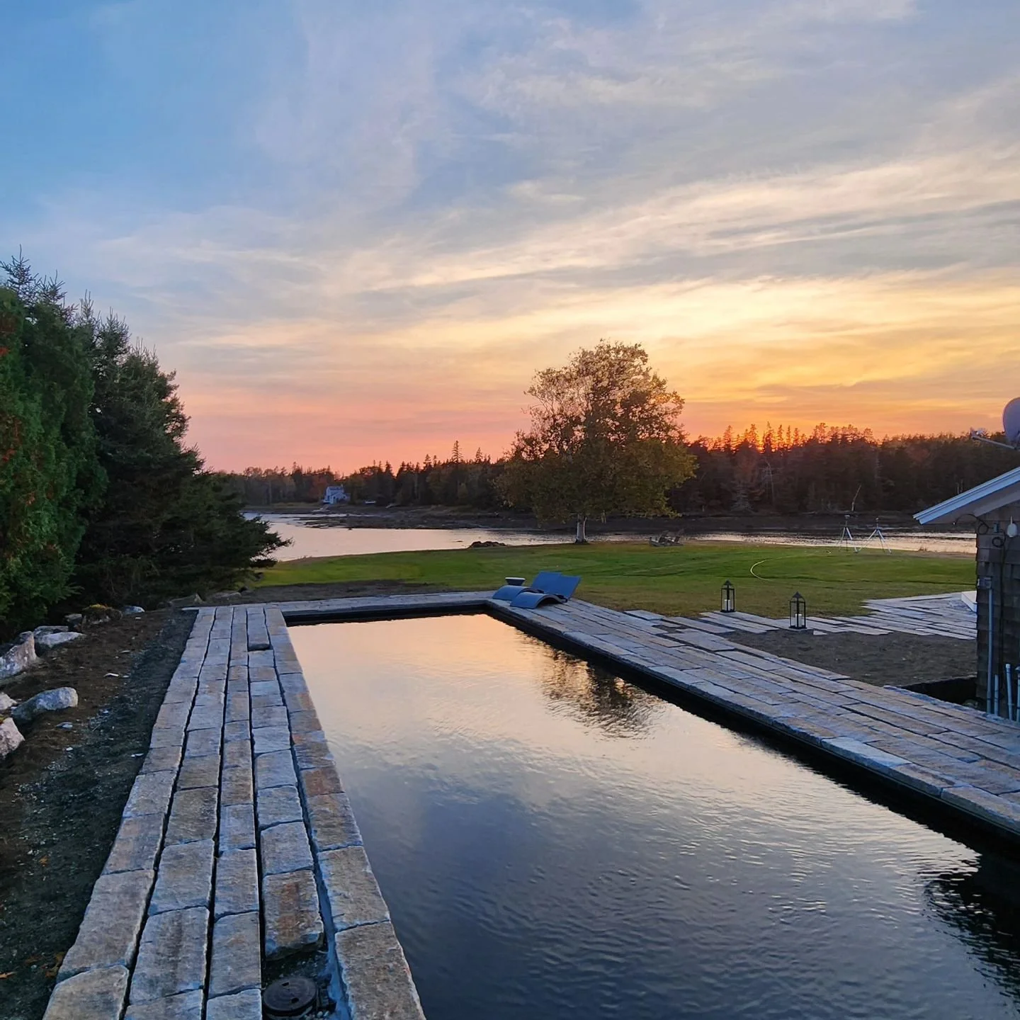 Beautiful sunset at our Bass Harbor pool project. We used reclaimed granite curbing for the pool decking and walks.

#pool #pooldesign #reclaimedgranite #landscapearchitecture #bassharbor  #sunset #mountdesertisland #maine #acadia @acadialandscape