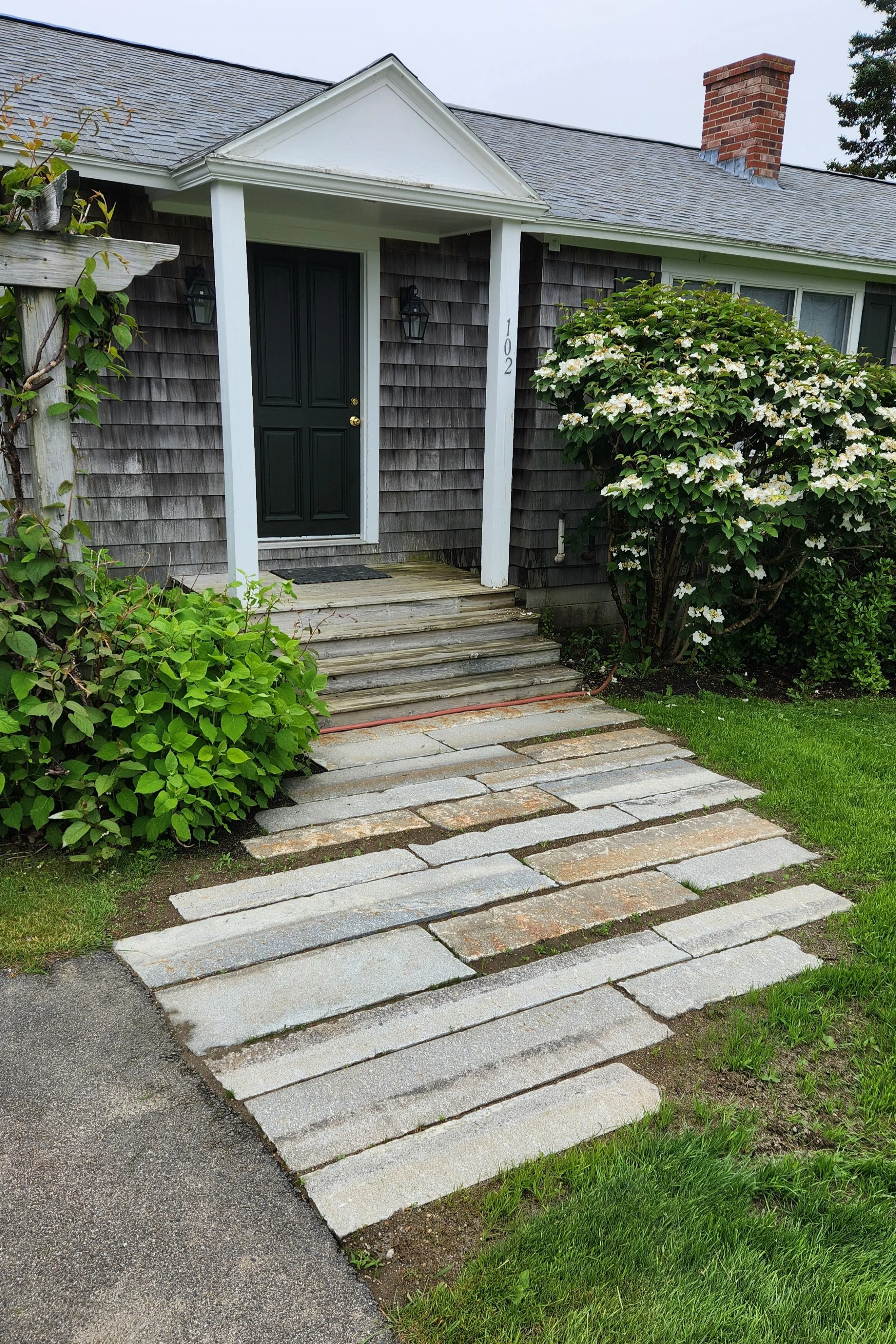 Granite curbing walk to house