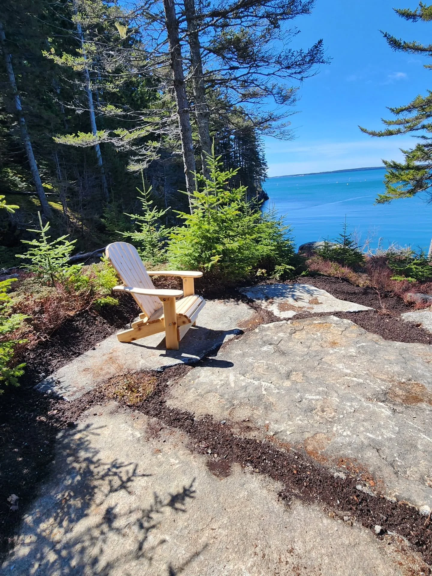 We set large granite slabs to create this natural looking stone patio with breathtaking ocean views.

#stonework #granite #patio #natureinspired #mainelandscapes @acadialandscape