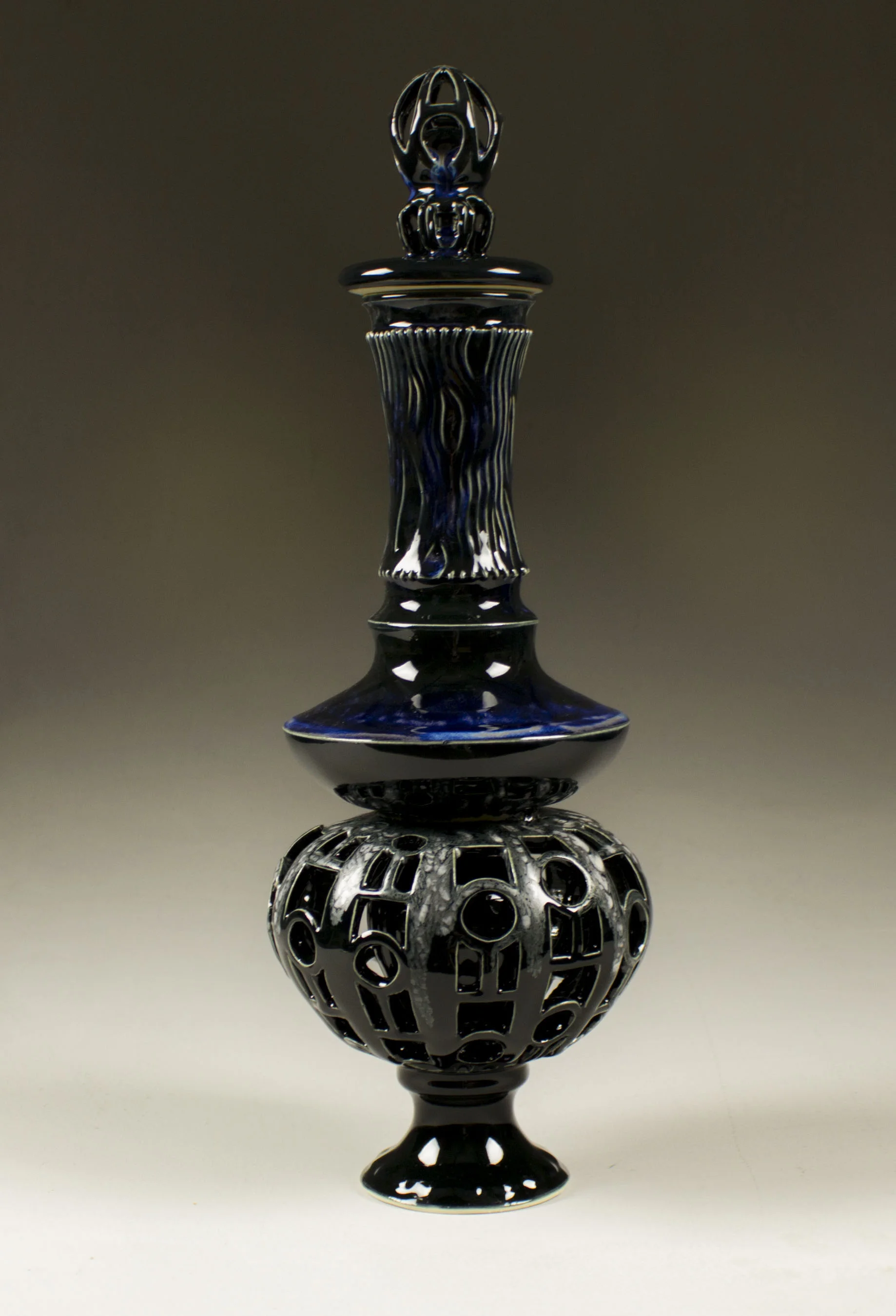 Pierced Black Bottle.JPG