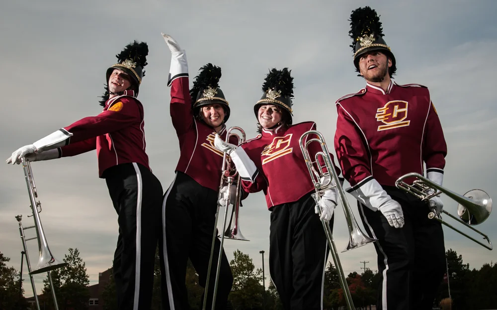 Members of the Central Michigan University Marching Band pose for a portrait on the campus of CMU in Mount Pleasant, Mich. on Oct. 1, 2015.
