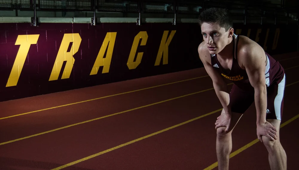 Monte Scott, Central Michigan University senior from Freeland, Mich. poses on the track on the campus of CMU in Mt. Pleasant, Mich. on Feb. 10, 2016.  Scott specializes in the Steeplechase.