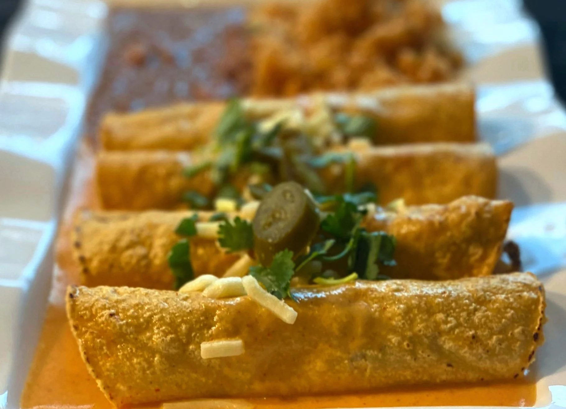 17.a.CREAM SAUCE ENCHILADAS MEAL.Taco.Amigo.jpg
