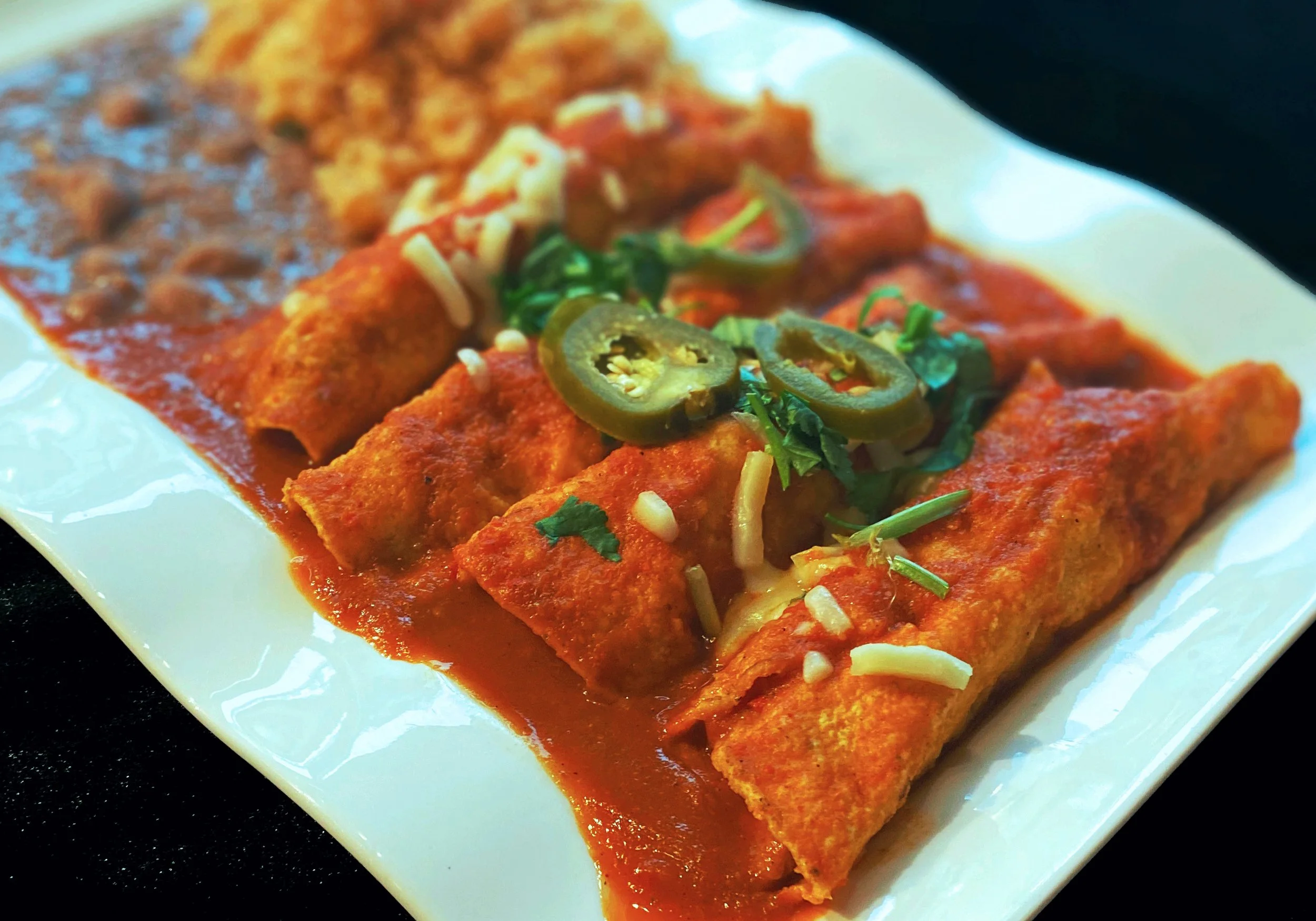 16.a.RED CHILLI SAUCE ENCHILADAS MEAL.Taco.Amigo.jpg