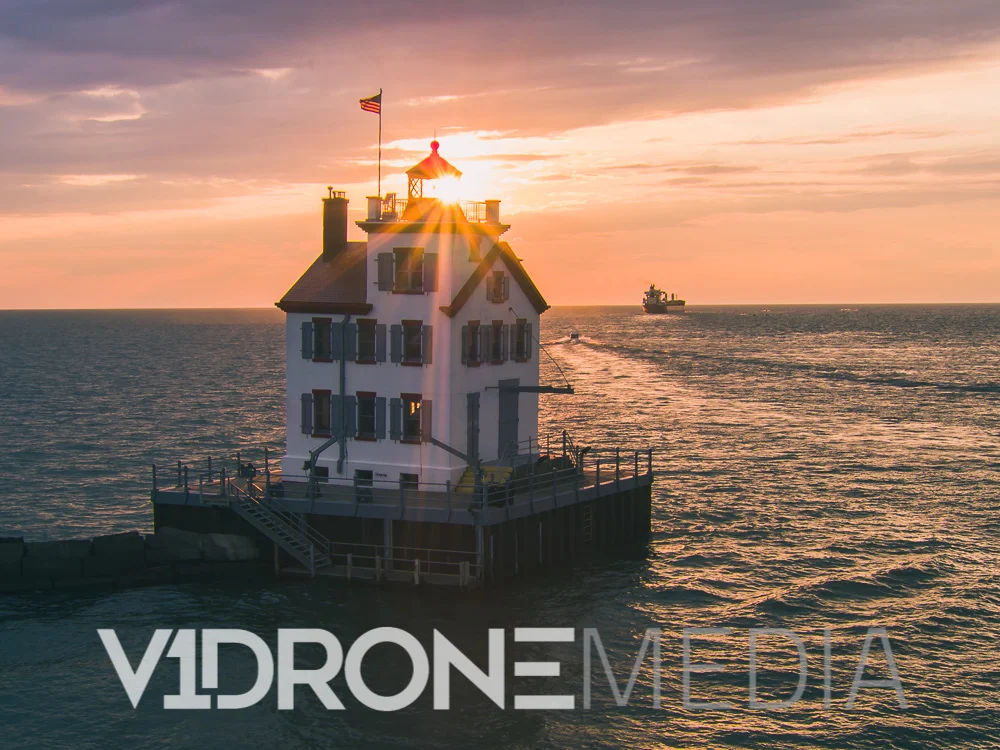Aerial Photo Of Lorain Lighthouse With Ship in Background