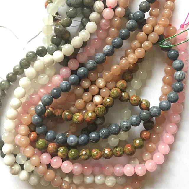 Mala // I love sorting through my beads to find the perfect combination for a custom mala order. Some of these I purchased for a custom #fertility mala. The one I&rsquo;m working on now is for mental and physical health and well-being.🌺 #japamala #m