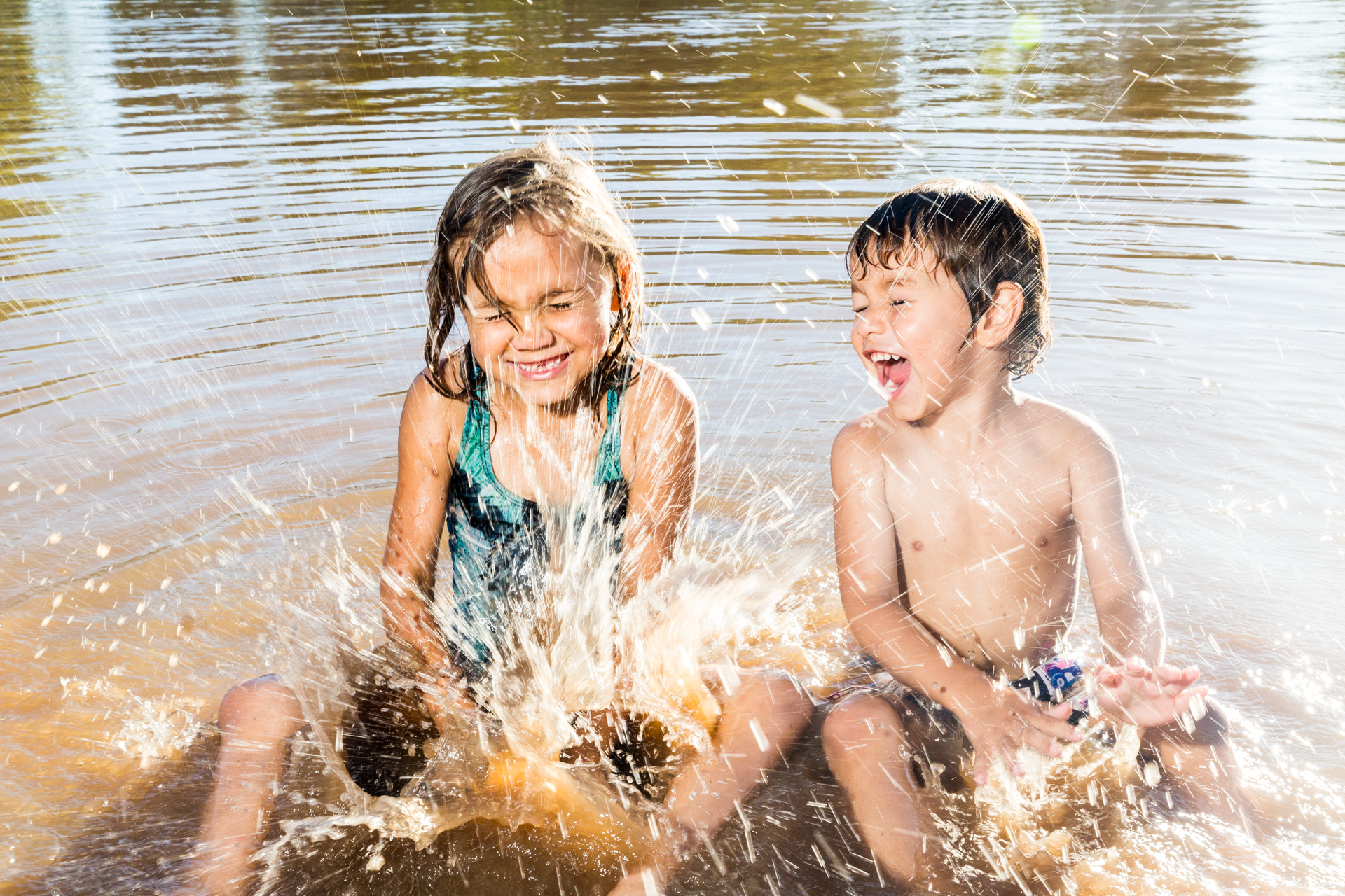I found Pearl and Lachlan splashing in the river at the north of town and took this photo for the paper. I got very wet.
