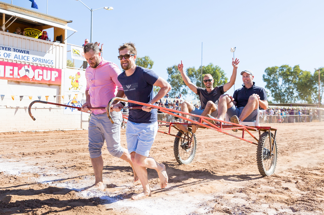 Business at the front, party at the back for this team as they cross the finish line first