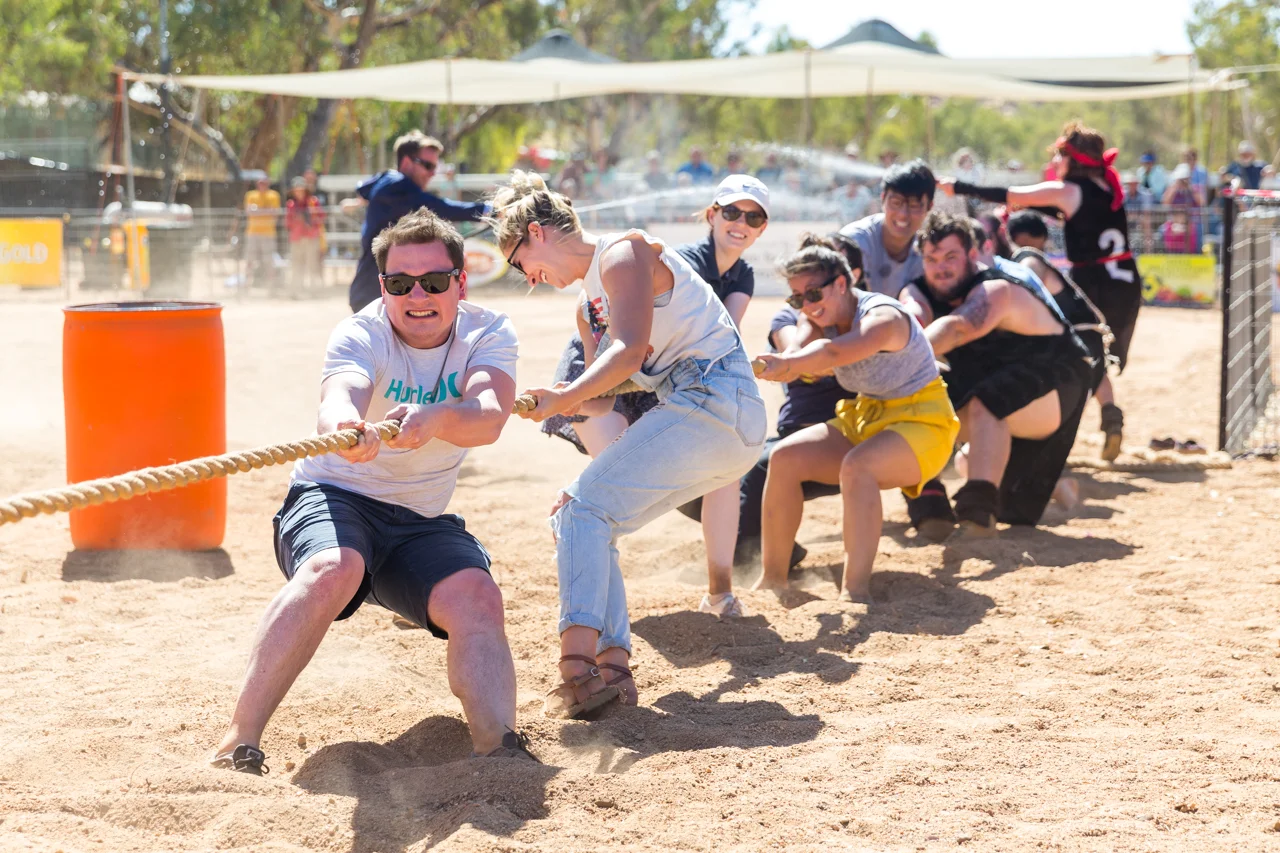 A team from the Alice Springs Hospital gives it their all (with the help of some Vikings at the back)