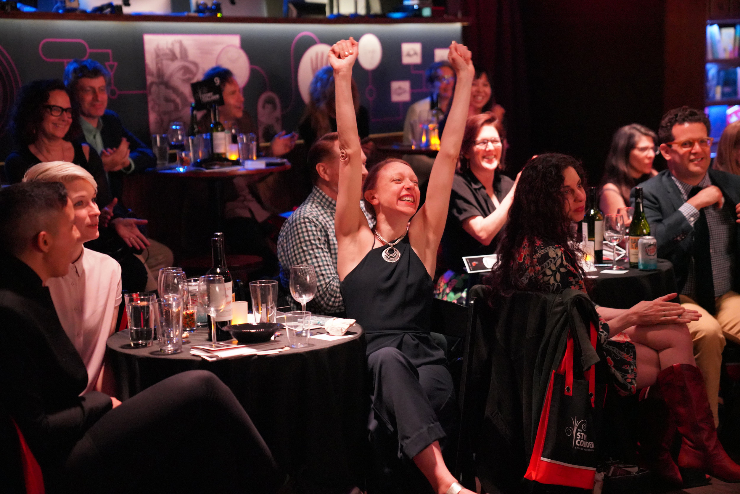  Story Collider NYC producer Paula Croxson celebrates her raffle victory! (It wasn’t rigged, we swear!) 