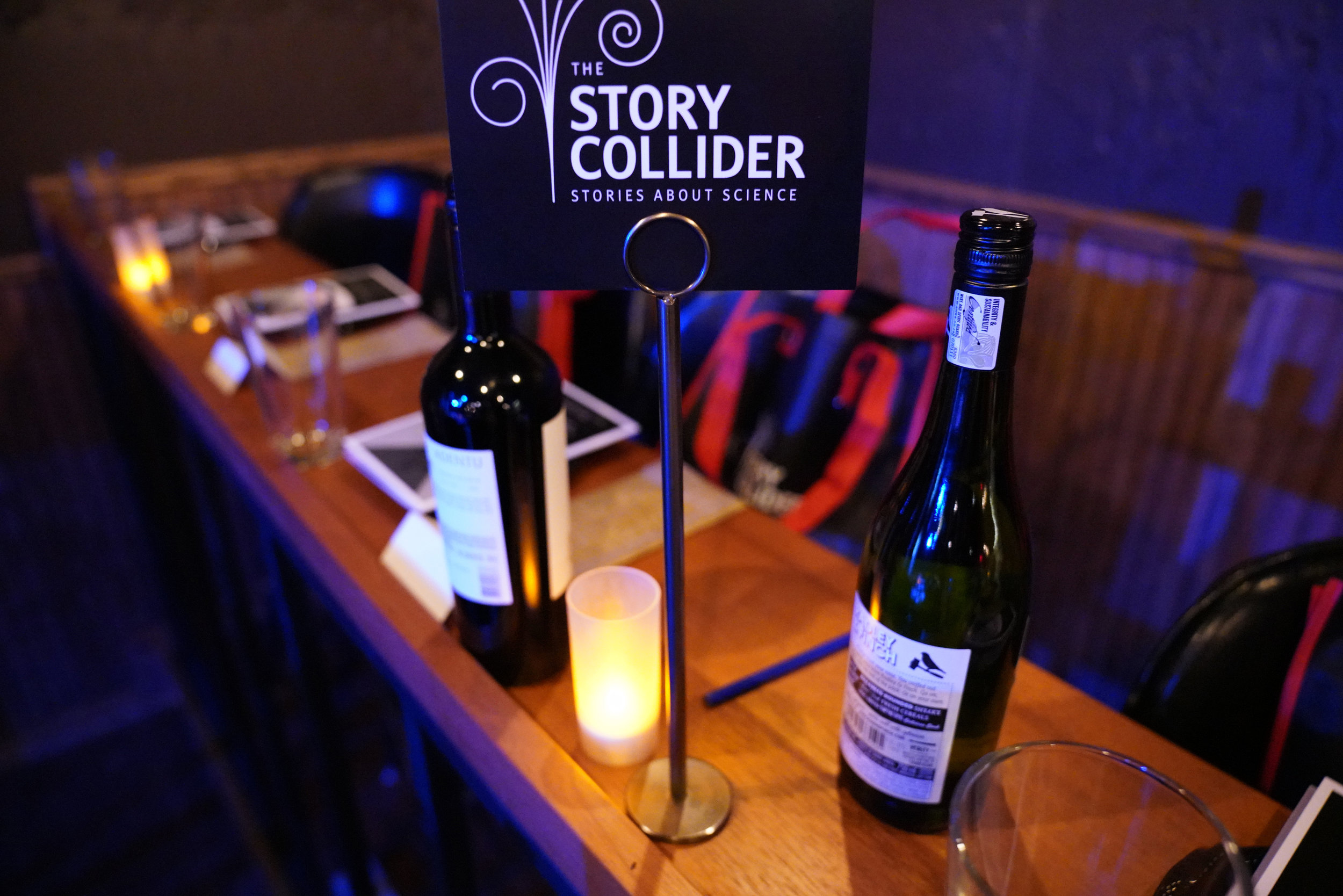  Gift bags and wine are all ready for our guests, thanks to Story Collider volunteers who worked diligently on setup! (Special thanks to  Lavender Wind Farm  for providing accessories for our gift bags!) 