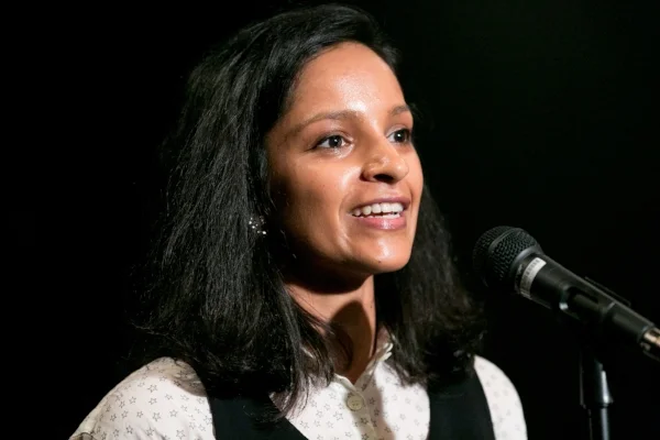 Sushma Subramanian shares her story at Busboys and Poets in Washington, DC. Photo by Michael Bonfigli.