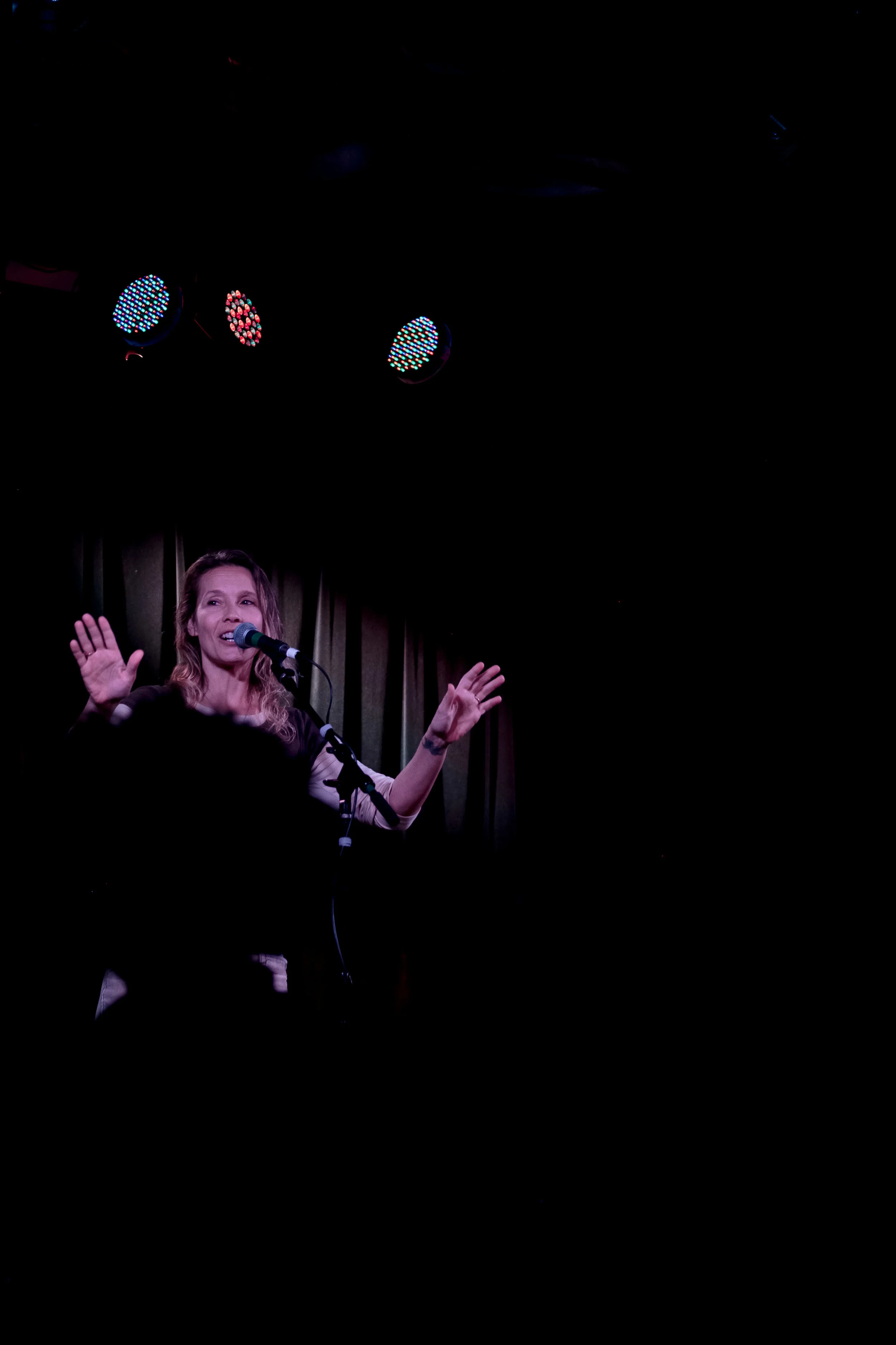Denise Coberly shares her story with us at The Maintenance Shop in Ames, IA in October 2018 in our show presented in partnership with Iowa State University. Photo by Mark Looney.