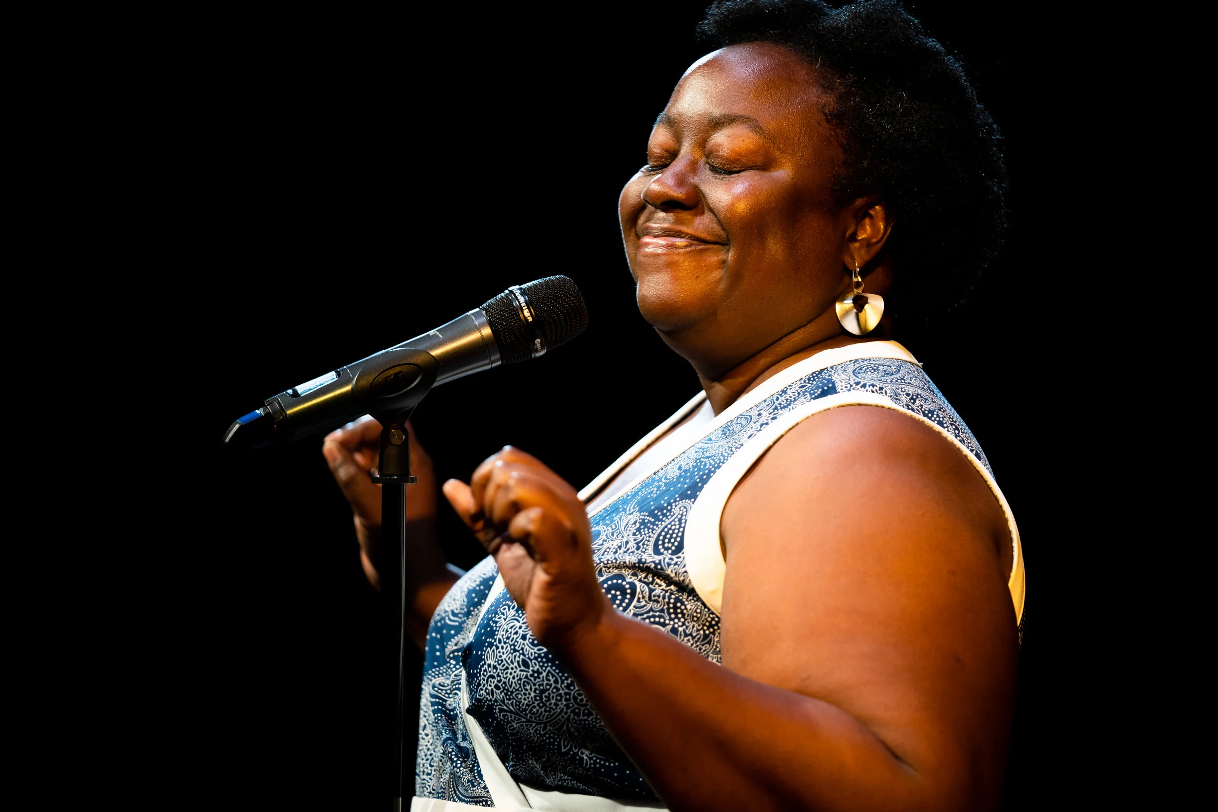 Latasha Wright shares her story with the Story Collider audience at Caveat in NYC in November 2018. Photo by Zhen Qin.