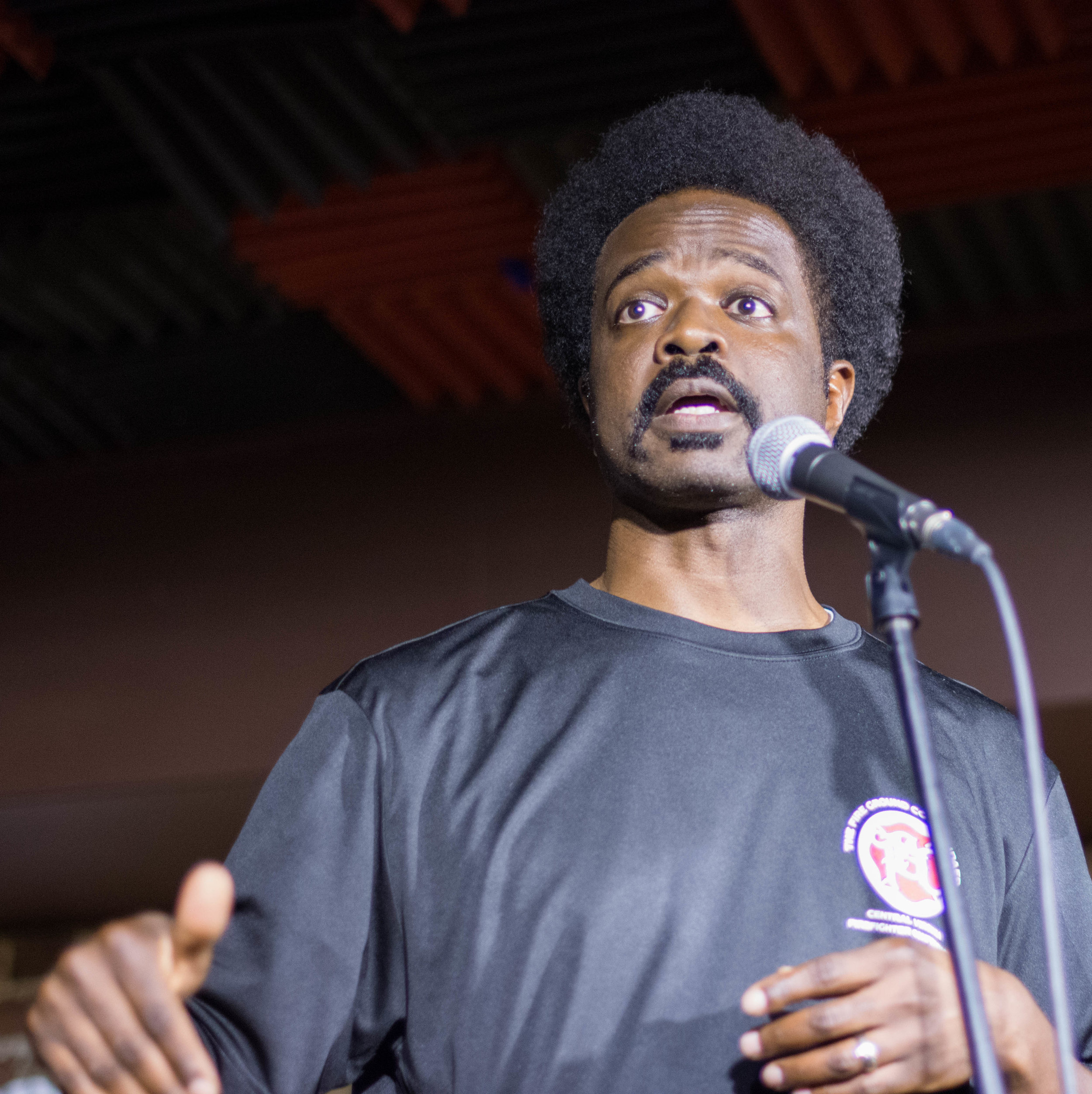 Nick Baskerville shares his story on the Story Collider stage in Washington DC at Bier Baron Tavern in August 2018. Photo by Lauren Lipumba.