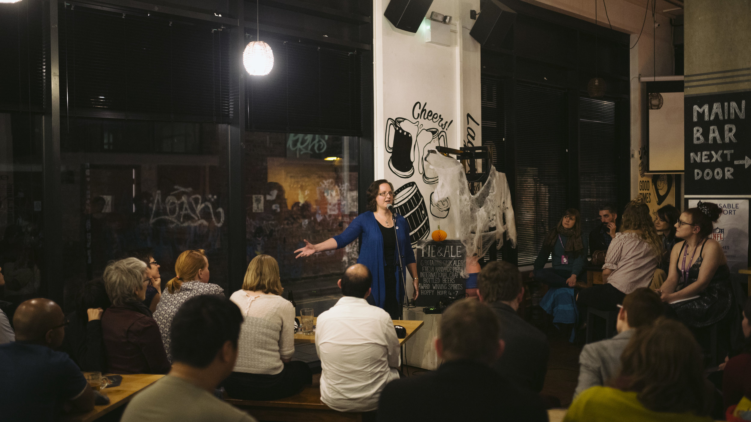 Heather Williams shares her story with The Story Collider at Pie and Ale as a part of the Manchester Science Festival. Photo by Drew Forsyth.