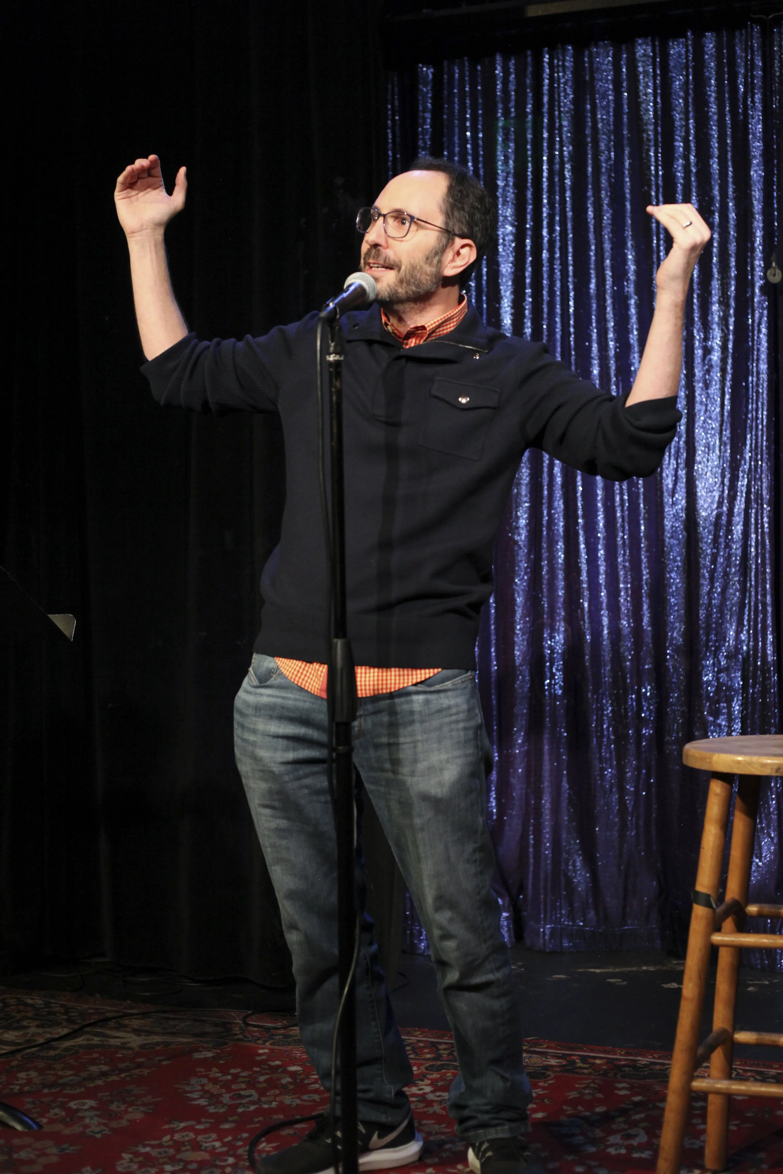 Josh Flaum shares his story with the Story Collider audience at Lyric Hyperion in Los Angeles in December 2018. Photo by Mari Provencher.