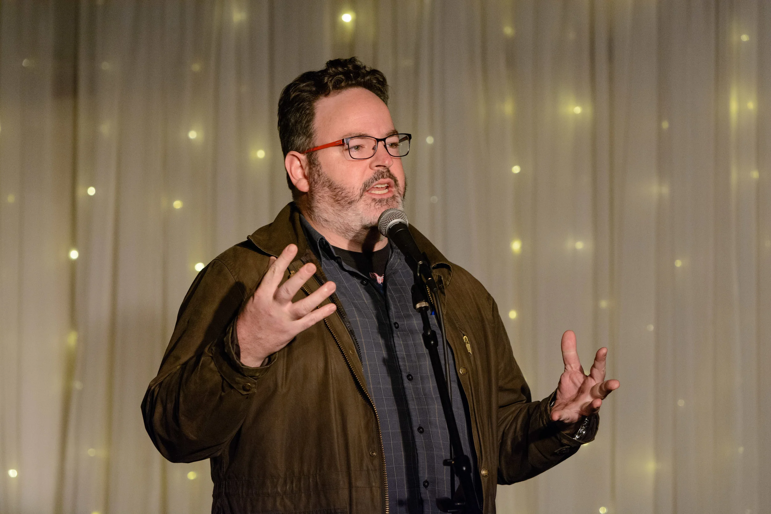 Ed Greco shares his story with our audience at Highland Inn and Ballroom in January 2019. Photo by Rob Felt.