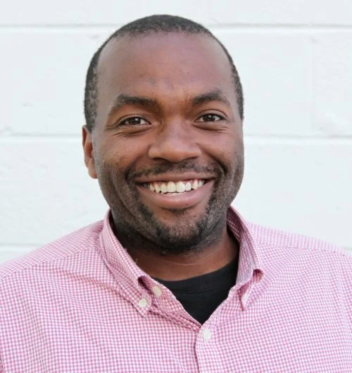 Nsikan-Akpan_headshot-500x0-c-default (1).jpg