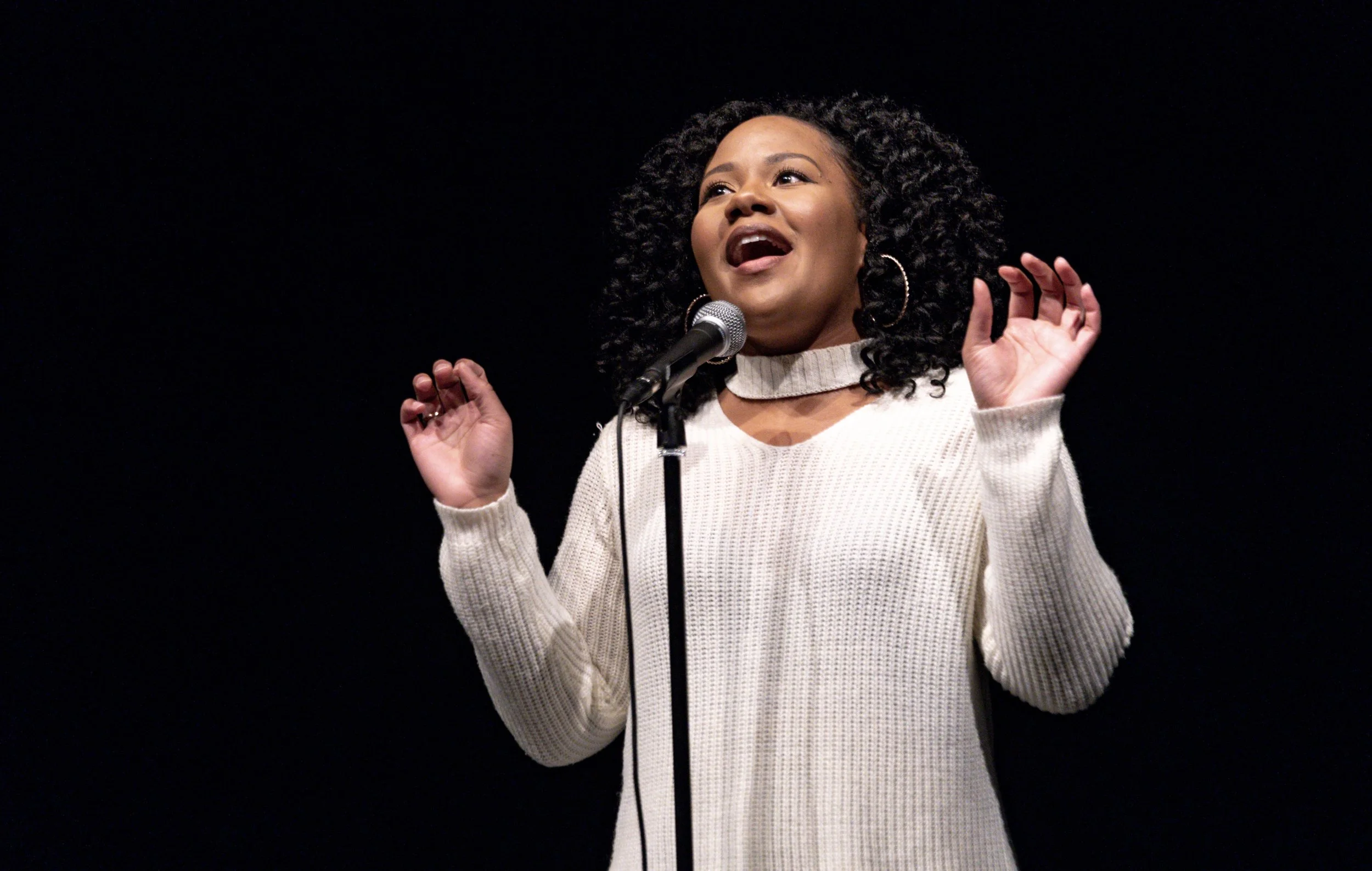 Jeannie Purchase shares her story with the Story Collider audience as part of a show produced in partnership with Virginia Tech in Blacksburg, VA in March 2019. Photo by Freddy Paige.