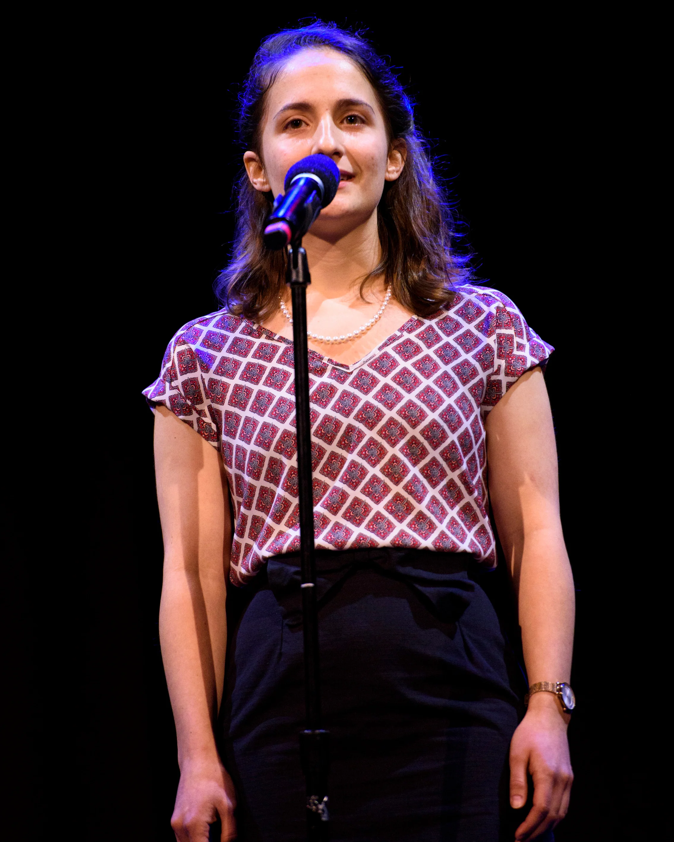 Tajana Schneiderman shares her story with the Story Collider audience at the Oberon in Boston, MA in February 2019. Photo by Kate Flock.